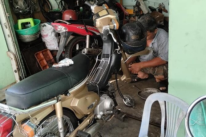 Da Nang Food Tour Motorbike & Sightseeing By Ao Dai Lady Rider - Sun Wheel area and the night market photo rhythm