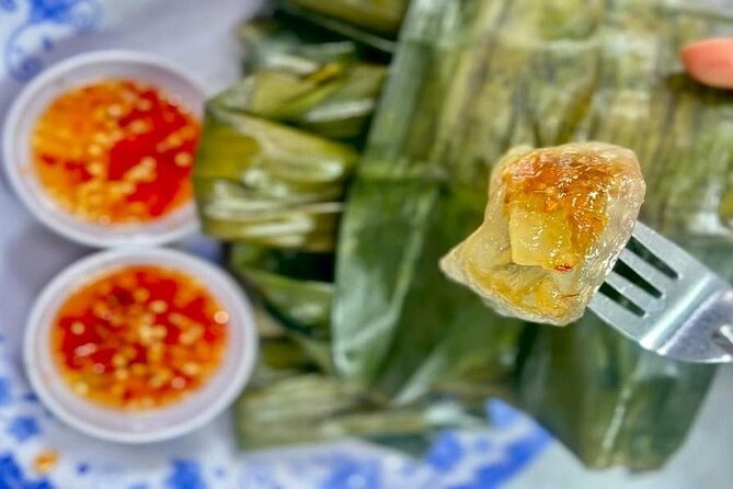 Da Nang Food Tour Motorbike & Sightseeing By Ao Dai Lady Rider - Love Bridge walk: quick landmark time with real photo payoff