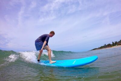 Go Surfing In Danang AND Hoi An - Da Nang’s teaching style: Tom, Rob, and the calm “you’ve got this” approach