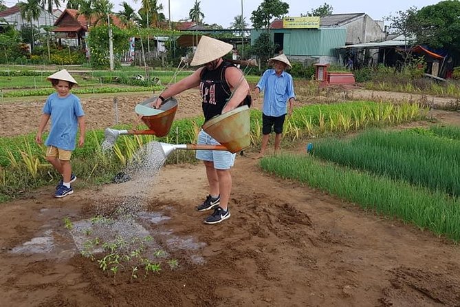 MY SON Tour & Hoi An Countryside with Basket Boat, Buffalo Ride,Farming Activity - Tra Que Vegetable Village: Meet a Family, Try Their Drinks, See Farming